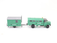 Roco H0 1545 Modellauto LKW MAN Koffer mit einem Bauwagen...