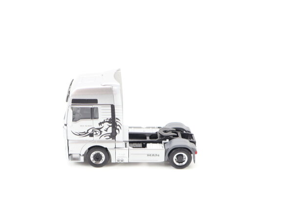 Herpa H0 Modellauto LKW MAN TGX 18.680 V8 Zugmaschine silber-metallic 1:87