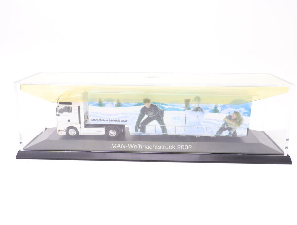 Herpa H0 09.38069-0241 LKW MAN  Weihnachtstruck 2002 "MAN Frohe Weihnachten" OVP