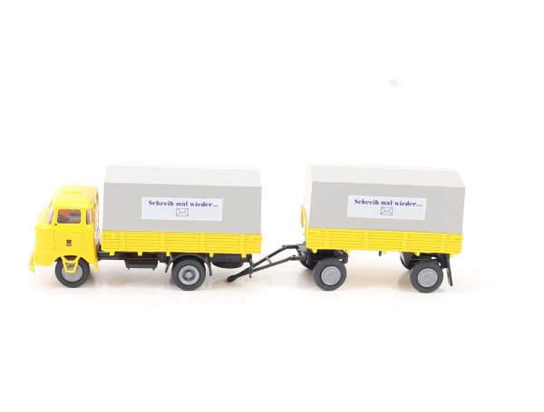 s.e.s. ? H0 Modellauto LKW IFA W 50L Pritschen-Lastzug "DBP Schreib mal wieder"