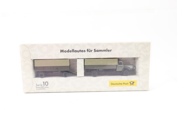 AWM H0 010578 Modellauto LKW Iveco "Deutsche Post Jahreswagen 2006" 1:87 OVP