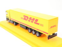 AMW H0 006738 Modellauto aus Set "Aus Danzas wird DHL" MB Actros 1:87 in Vitrine